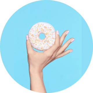 Manicure Hand With Pastel Nails Holding Donut Sticker 