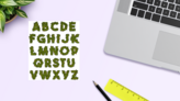 Marijuana Alphabet Sticker Sheet on a Desk (New) example