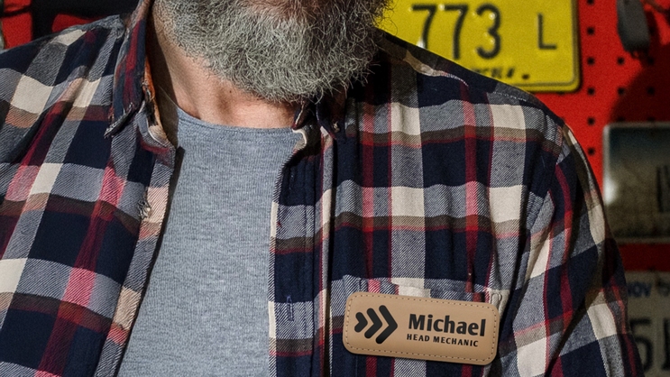 Mechanic with a custom engraved name tag