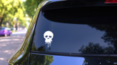Melting Skull Sticker on a Rear Car Window (New) example