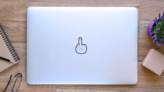 Middle Finger Icon Sticker on a Laptop (New) example