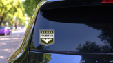Military Fighter Badge Sticker on a Rear Car Window (New) example
