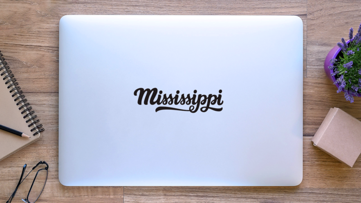 Mississippi Calligraphy Sticker on a Laptop (New) example