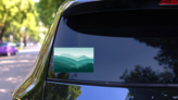 Misty Green Mountains Stickers on a Rear Car Window (New) example