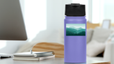 Misty Green Mountains Stickers on a Water Bottle (New) example