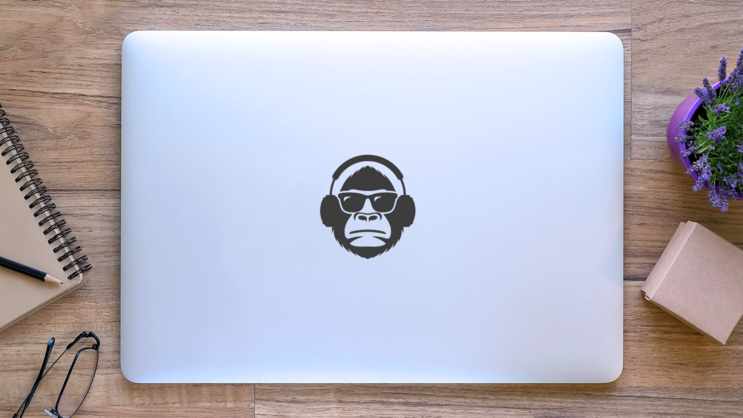 Monkey In Sunglasses And Headphones Sticker on a Laptop (New) example