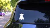 Monkey Silhouette With Tail To The Left Sticker on a Rear Car Window (New) example