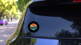 Montana Take A Hike Color Orange And Green Sticker on a Rear Car Window (New) example