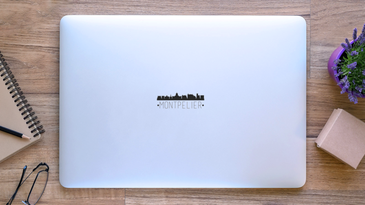 Montpelier Vermont City Skyline Lettering sticker on a Laptop (New) example