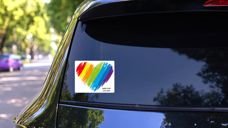More Love Less Hate Rainbow Heart Sticker on a Rear Car Window (New) example