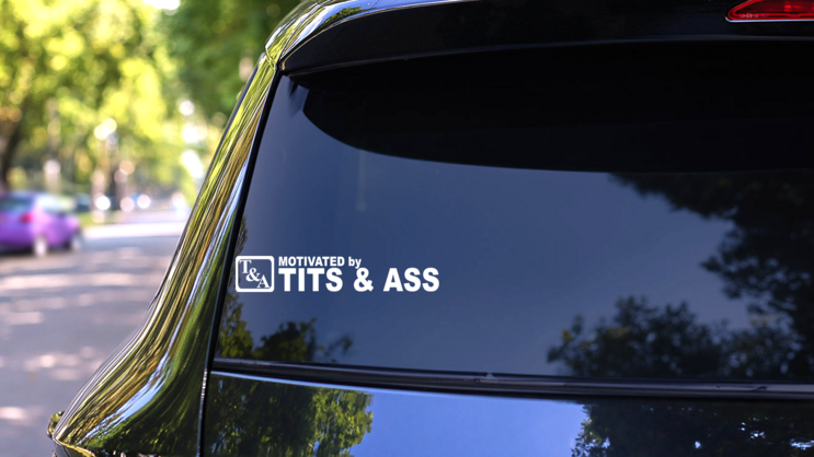 Motivated By Tits And Butt Sticker on a Rear Car Window (New) example