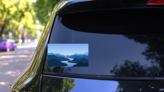 Mountains And Blue River Sticker on a Rear Car Window (New) example
