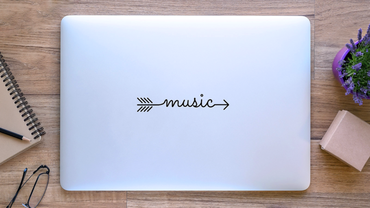 Music Arrow Sticker on a Laptop (New) example