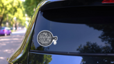 My Kitchen My Rules Cast Iron Skillet Sticker on a Rear Car Window (New) example