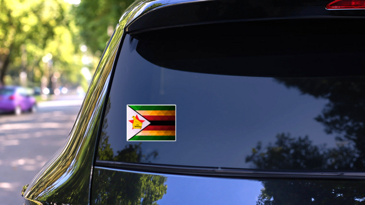 National Flag Of Zimbabwe Sticker on a Rear Car Window (New) example