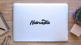 Nebraska Hand Lettering Sticker on a Laptop (New) example