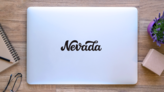 Nevada Calligraphy Sticker on a Laptop (New) example