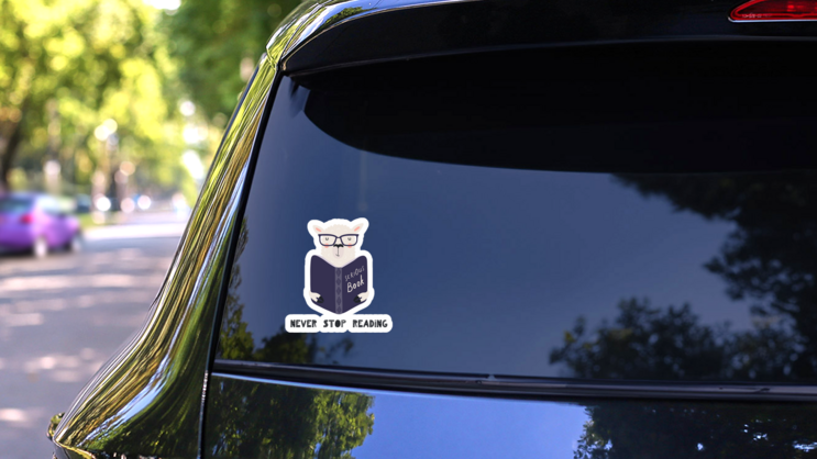 Never Stop Reading Cute Funny Llama Sticker on a Rear Car Window (New) example