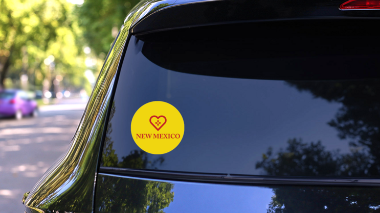 New Mexico State Flag Heart Shape Sticker on a Rear Car Window (New) example