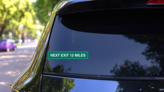 Next Exit 12 Miles Sticker on a Rear Car Window (New) example