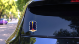 Night Scene Illustration Of A Tropical Tiki Torch Sticker on a Rear Car Window (New) example