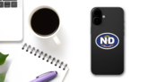 North Dakota Nd State Flag Oval Sticker on a Phone (New) example