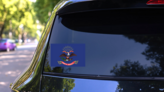 North Dakota Nd State Flag Sticker on a Rear Car Window (New) example