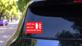 Not For Use On Electrical Fires Sign Sticker on a Rear Car Window (New) example