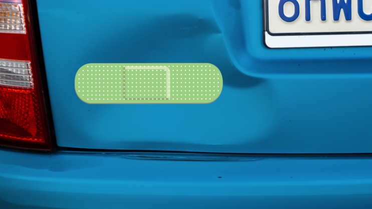 Oblong Green Band Aid Bandage Sticker on a Dented Car example