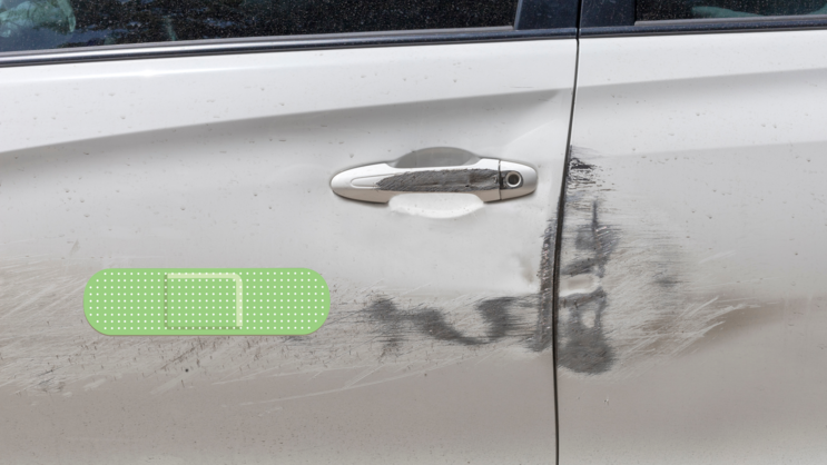 Oblong Green Band Aid Bandage Sticker on a Scratched Car example