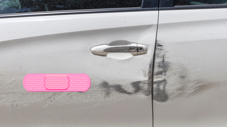 Oblong Pink Band Aid Bandage Sticker on a Scratched Car example