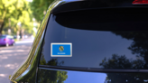 Oklahoma Usa Flag On Old Postage Stamp Sticker on a Rear Car Window (New) example