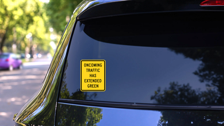 Oncoming Traffic Has Extended Green Sticker on a Rear Car Window (New) example