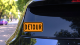 Orange Detour Sticker on a Rear Car Window (New) example