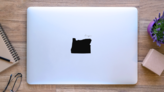 Oregon Black Silhouette Map Sticker on a Laptop (New) example