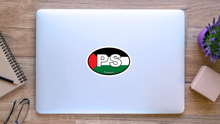 Palestine Ps Flag Oval Sticker on a Laptop (New) example