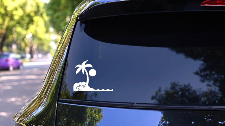 Palm Tree On An Island With Sun Sticker on a Rear Car Window (New) example