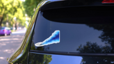 Paper Boat Sticker on a Rear Car Window (New) example