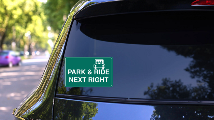 Park And Ride Next Right Sticker on a Rear Car Window (New) example