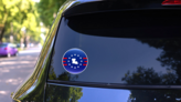 Patriotic Louisiana Button Sticker on a Rear Car Window (New) example