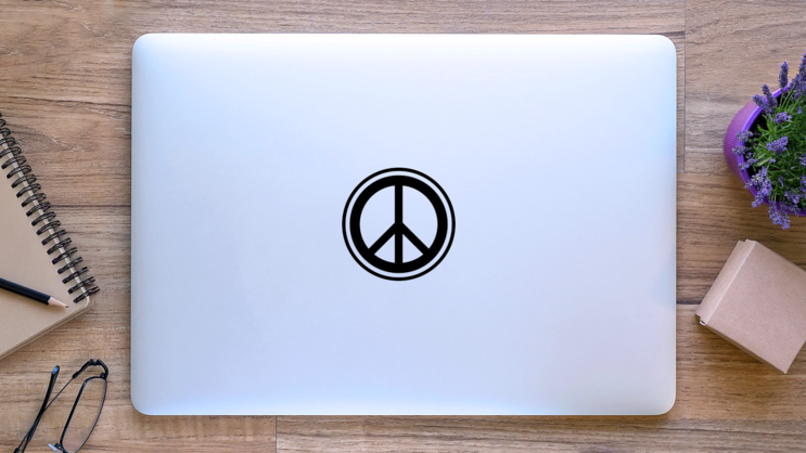 Peace Sign Outline Sticker on a Laptop (New) example