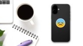 Phone Emoji Sticker Sad on a Phone (New) example