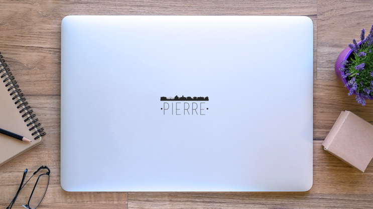 Pierre South Dakota City Skyline Lettering Sticker on a Laptop (New) example