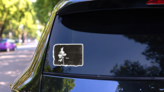 Pine Silhouette On Grunge Background Illustration Sticker on a Rear Car Window (New) example