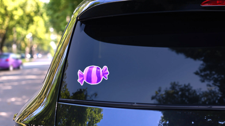 Pink And Purple Candy Wrapper Sticker on a Rear Car Window (New) example