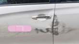 Pink Band Aid Bandage Sticker on a Scratched Car example