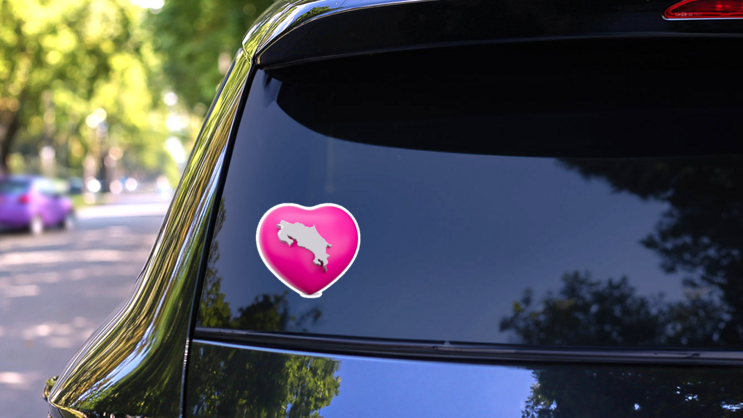 Pink Heart Costa Rica Sticker on a Rear Car Window (New) example