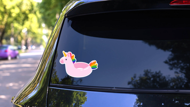 Pink Unicorn Swim Ring Sticker on a Rear Car Window (New) example