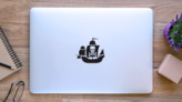 Pirate Ship With Skull And Crossed Bones Sail Sticker on a Laptop (New) example