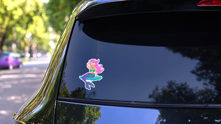 Pixel Art Mermaid On Stone Sticker on a Rear Car Window (New) example